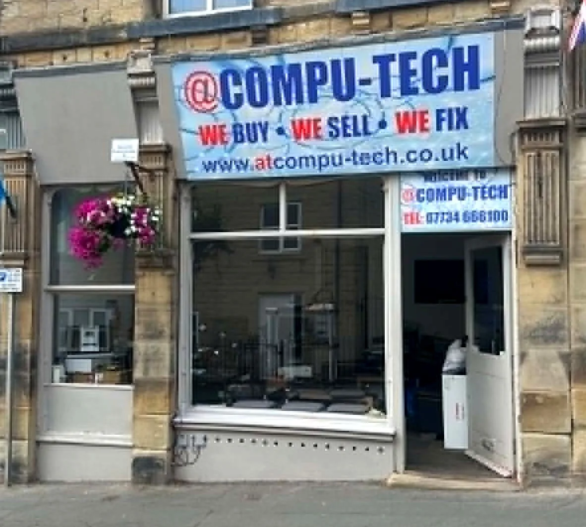 The @Compu-Tech shop front on Queen Street in Horbury, with the We Buy We Sell We Fix sign above the window